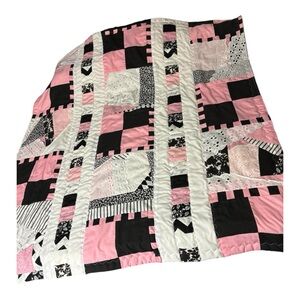 Baby or lap quilt. 36”x39” approx.  pink white black and lace